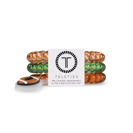 Colorful hair ties in a box with 'Teleties' branding on a white background