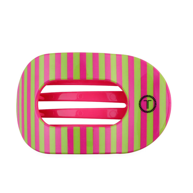 Round flat hair clip with pink and green stripes on a white background