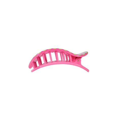 Pink hair clip on a white background