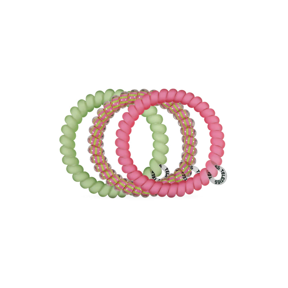 Set of three colorful beaded bracelets on a white background