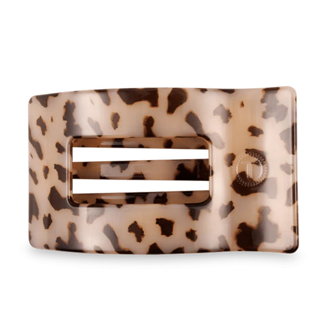 Leopard print hair clip on a white background