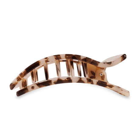 Tortoiseshell hair clip on a white background