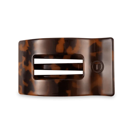 Tortoiseshell hair clip on a white background