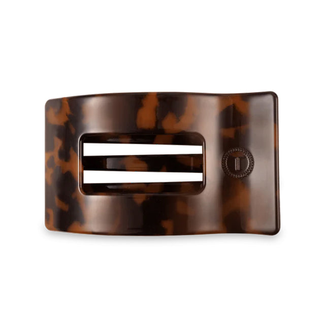 Tortoiseshell hair clip on a white background