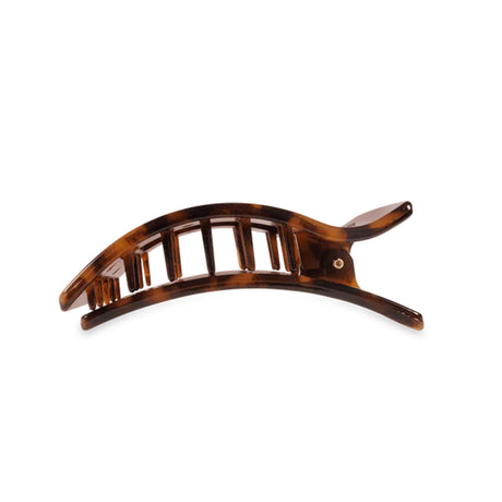 Brown hair clip on a white background