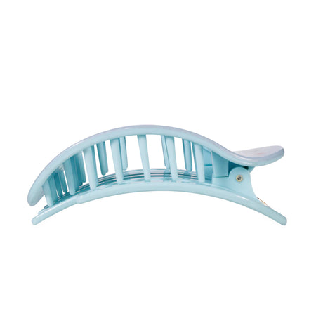Light blue hair clip on a white background