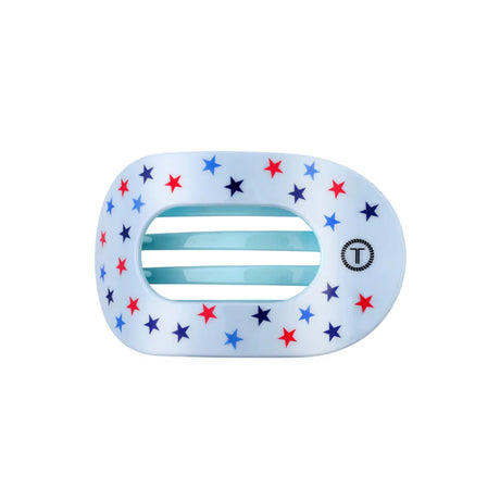 hair clip with star pattern and striped design on a white background