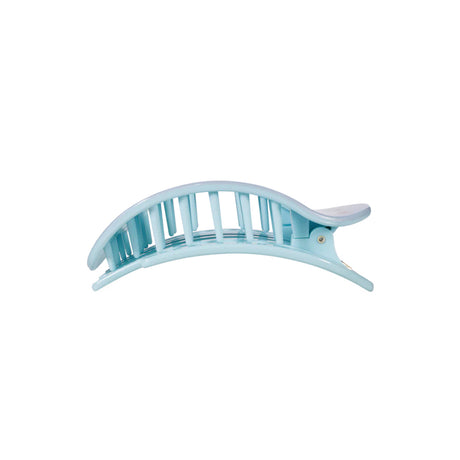Light blue hair clip on a white background