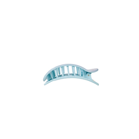 Light blue hair clip on a white background
