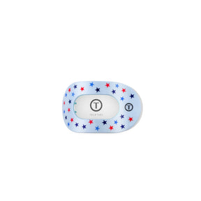Small hair clip with star pattern on a white background