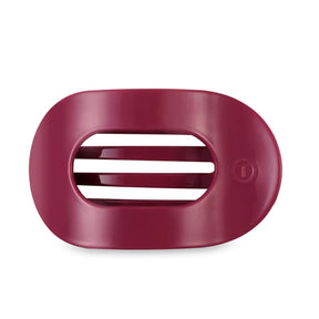 Maroon hair clip on a white background