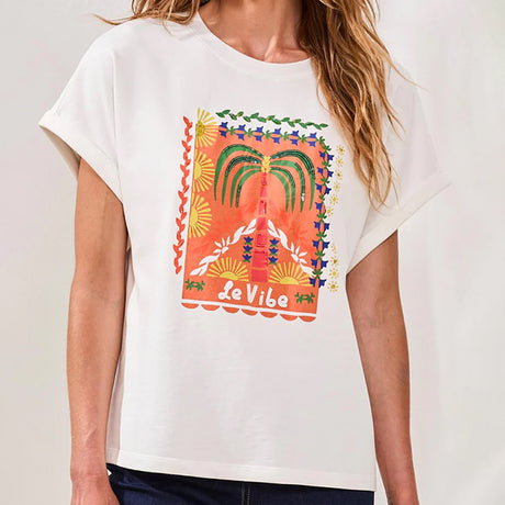 White t-shirt with colorful graphic design and 'Le Vibe' text on a plain background