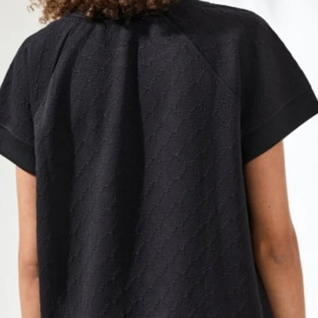 Black textured dress on a white background