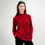 Woman wearing a red sweater with black pattern on a white background