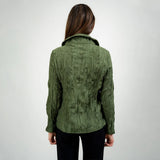Person wearing a green textured jacket on a white background