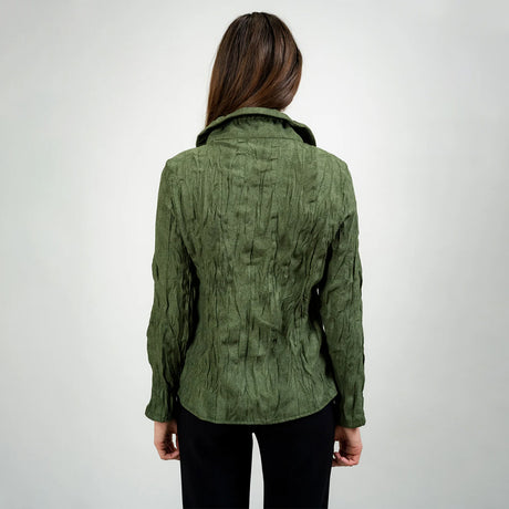 Person wearing a green textured jacket on a white background