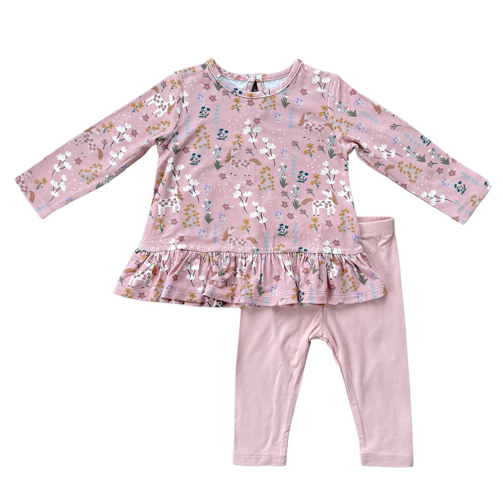 Pink children's outfit with floral pattern on a white background