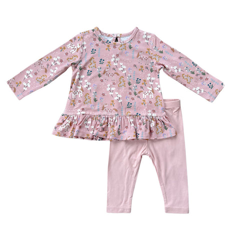 Pink children's outfit with floral pattern on a white background