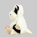 White plush toy with black accents on a light gray background