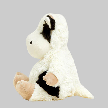 White plush toy with black accents on a light gray background