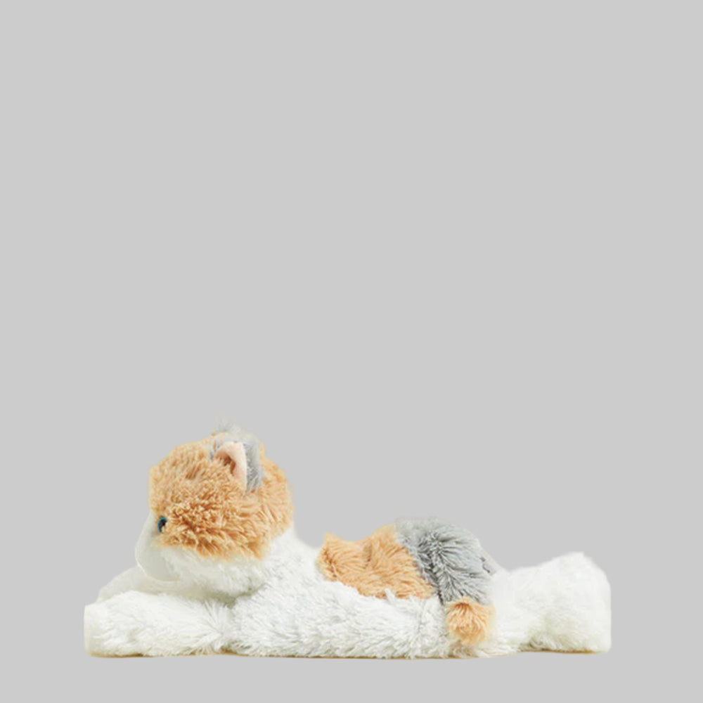 Plush toy resembling a cat with gray and orange fur on a light gray background