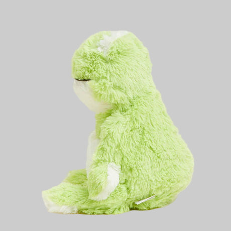 Green plush toy on a gray background