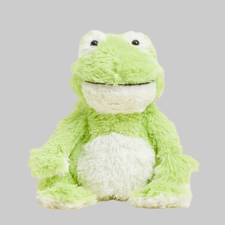Green plush frog toy on a gray background