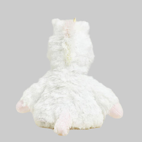 white plush unicorn with gray background