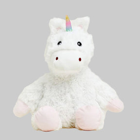 white plush unicorn with gray background