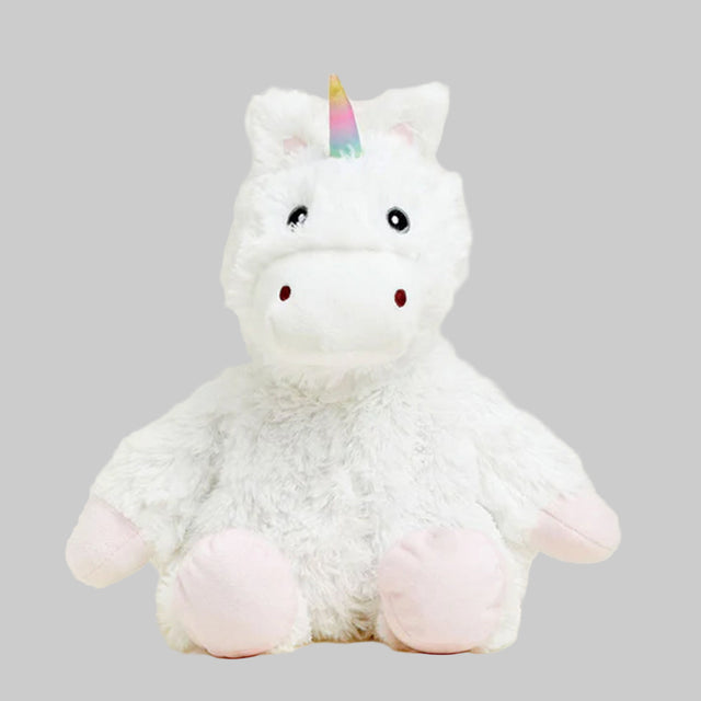 white plush unicorn with gray background