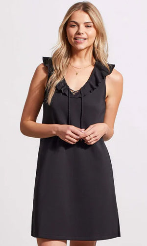 Woman wearing a black sleeveless dress
